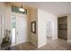 Bright and airy entryway with tile flooring and decorative accents at 2471 W Price Blvd, North Port, FL 34286