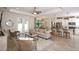 Open living space featuring a comfortable sofa and access to the backyard at 2471 W Price Blvd, North Port, FL 34286