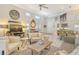 Bright and airy living room with comfortable seating and large TV at 3924 Alamanda Dr, Sarasota, FL 34238