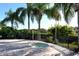 Relax in this community hot tub, nestled in a lush tropical landscape at 3924 Alamanda Dr, Sarasota, FL 34238