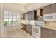 Modern kitchen features granite counters, stainless steel appliances, and ample cabinet space at 3924 Alamanda Dr, Sarasota, FL 34238