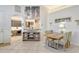 Elegant dining area with view into kitchen and living room at 3924 Alamanda Dr, Sarasota, FL 34238