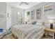 Serene bedroom with king-size bed and calming decor, offering a peaceful retreat at 3924 Alamanda Dr, Sarasota, FL 34238