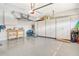 Garage offers ample storage with built-in cabinets and epoxy flooring at 3924 Alamanda Dr, Sarasota, FL 34238