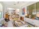 Bright sunroom with comfortable seating and views of the backyard at 3924 Alamanda Dr, Sarasota, FL 34238