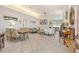 Open concept living area with dining space, comfortable seating, and ample natural light at 3924 Alamanda Dr, Sarasota, FL 34238