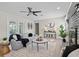 Spacious living room with fireplace and French doors at 1012 Myrtle Ave, Venice, FL 34285