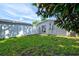 Backyard view showing a shed and grassy area at 1012 Myrtle Ave, Venice, FL 34285