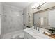 Clean bathroom with marble tile and modern vanity at 1012 Myrtle Ave, Venice, FL 34285