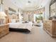 Spacious main bedroom with large bed and ample closet space at 9312 Firethorn Pl, Lakewood Ranch, FL 34202