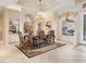 Formal dining room with a chandelier and hardwood floors at 9312 Firethorn Pl, Lakewood Ranch, FL 34202