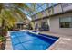 Inviting pool area with spa and covered patio at 13107 Belknap Pl, Lakewood Ranch, FL 34211