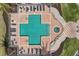 Aerial view of a community pool with plenty of lounge chairs and beautiful brick paver decking, offering a relaxing retreat at 14041 Bellagio Way # 214, Osprey, FL 34229