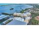 Scenic aerial view of waterfront condos with boat docks, providing a luxurious coastal lifestyle at 14041 Bellagio Way # 214, Osprey, FL 34229