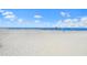 Expansive beach with soft white sand and clear blue skies, a perfect destination for relaxation at 14041 Bellagio Way # 214, Osprey, FL 34229