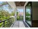 Exterior patio with tropical foliage views and an exterior ceiling at 2318 Bay St, Sarasota, FL 34237