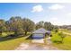 One-story home with a large yard and attached garage at 424 Logue Rd, Myakka City, FL 34251