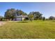 One story home with a large yard and attached garage at 424 Logue Rd, Myakka City, FL 34251