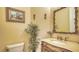 Bathroom with single vanity and toilet at 6918 73Rd E Ct, Bradenton, FL 34203