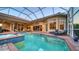 Resort-style pool and spa with covered lanai at 6918 73Rd E Ct, Bradenton, FL 34203