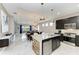 Modern kitchen with stainless steel appliances and an island at 2974 Trustee Ave, Sarasota, FL 34243