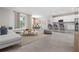 Open living space with kitchen, dining, and living areas at 2938 Woodward Ave, North Port, FL 34286