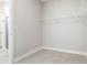 Spacious walk-in closet with wire shelving and neutral walls at 2938 Woodward Ave, North Port, FL 34286