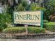 PineRun community entrance, no trespassing or soliciting at 232 Woodland Dr, Osprey, FL 34229