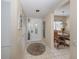 Light and airy entryway with tile floors and access to other rooms at 232 Woodland Dr, Osprey, FL 34229