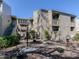 Two-story building with stairs and landscaping at 232 Woodland Dr, Osprey, FL 34229