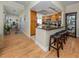 Kitchen with granite countertops, light wood cabinets, and stainless steel appliances at 232 Woodland Dr, Osprey, FL 34229