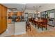Kitchen with granite countertops, light wood cabinets, and stainless steel appliances at 232 Woodland Dr, Osprey, FL 34229