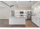Updated kitchen featuring white cabinets, quartz countertops, and stainless steel appliances at 11332 Rivers Bluff Cir, Lakewood Ranch, FL 34202