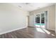 Bedroom with sliding doors to a view of the pool at 11332 Rivers Bluff Cir, Lakewood Ranch, FL 34202