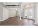 Elegant dining room with hardwood floors, large windows and a chandelier at 11332 Rivers Bluff Cir, Lakewood Ranch, FL 34202
