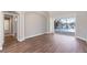 Bright living area featuring hardwood floors and access to a beautiful pool view at 11332 Rivers Bluff Cir, Lakewood Ranch, FL 34202