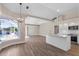 Modern kitchen with white cabinets, stainless steel appliances, and an island at 11332 Rivers Bluff Cir, Lakewood Ranch, FL 34202