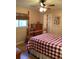 Bedroom with wood post bed and dresser at 4601 Ulster Ave, North Port, FL 34287