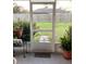 Screened patio with view of backyard at 4601 Ulster Ave, North Port, FL 34287