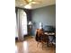 Bedroom with large windows and a home office setup at 4601 Ulster Ave, North Port, FL 34287