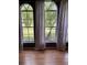 Bright living room featuring large windows with a view at 4601 Ulster Ave, North Port, FL 34287