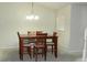 Dining area with square table and six chairs at 2086 Kings Palace Dr # 2086, Riverview, FL 33578