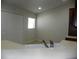 Kitchen with double sink and light countertops at 2086 Kings Palace Dr # 2086, Riverview, FL 33578