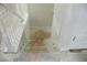 Unfinished basement stairs with wood flooring at 2086 Kings Palace Dr # 2086, Riverview, FL 33578