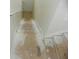 Unfinished basement stairs with wood flooring at 2086 Kings Palace Dr # 2086, Riverview, FL 33578