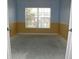 Empty bedroom with new flooring needed, featuring a window with blinds and neutral walls at 2086 Kings Palace Dr # 2086, Riverview, FL 33578