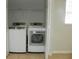 Laundry closet with washer and dryer at 2086 Kings Palace Dr # 2086, Riverview, FL 33578