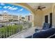 Spacious balcony with water views and seating at 14041 Bellagio Way # 214, Osprey, FL 34229