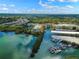 Aerial view showcasing the community's location, waterfront, and marina at 14041 Bellagio Way # 214, Osprey, FL 34229