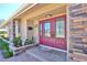 Double front doors with glass accents and stonework at 7207 13Th W Ave, Bradenton, FL 34209